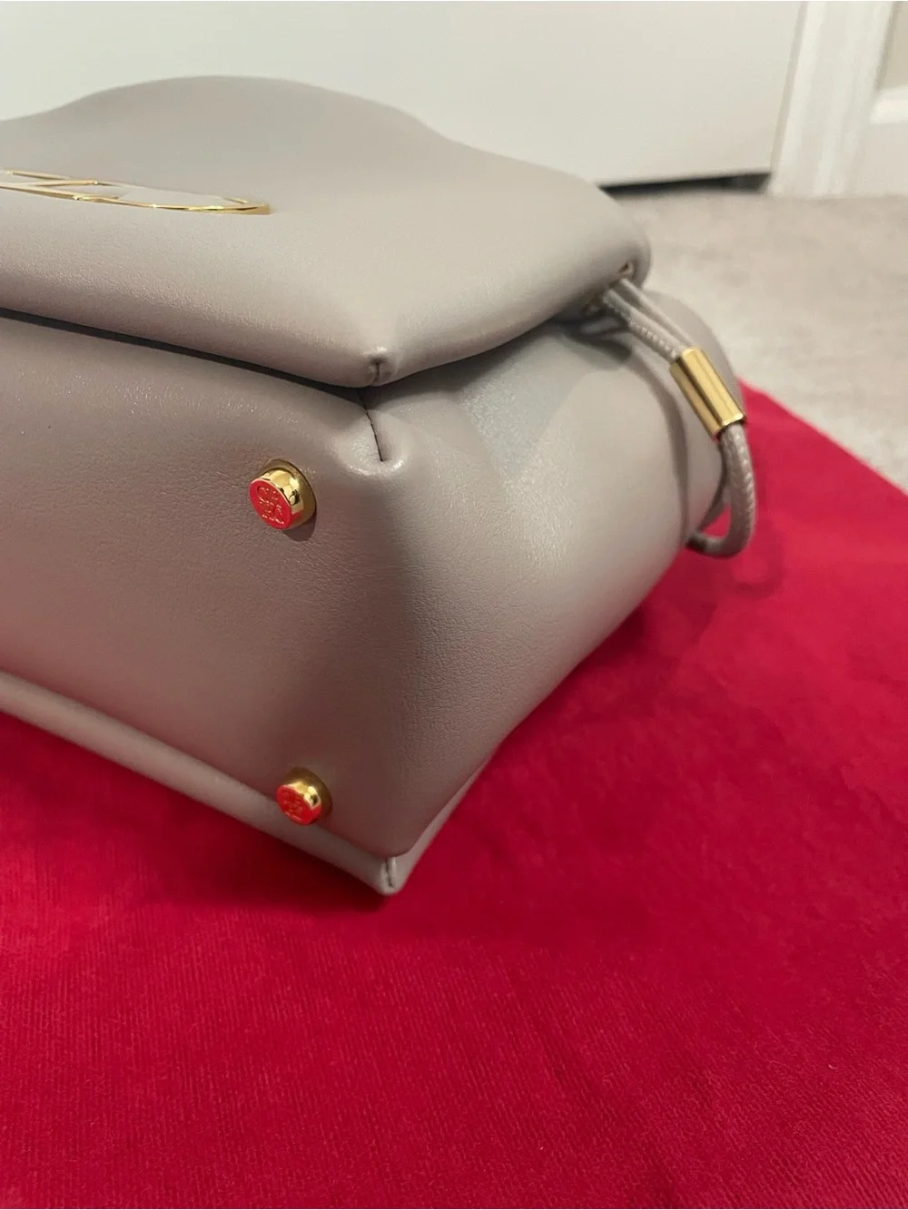 Carolina Herrera Leather Drawstring Crossbody Bucket Bag with Gold Hardware